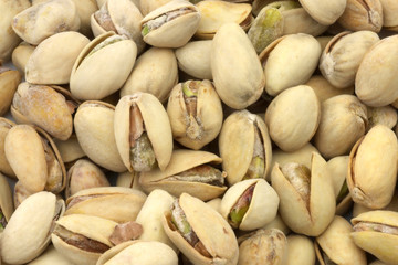 A nice view of pistachios nuts still in the shell ready to eat.
