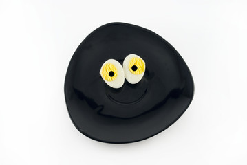 half boiled egg on a plate