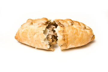 Cornish pasty isolated on a white studio background.