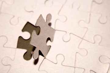 Fototapeta premium Final piece to complete jigsaw puzzle