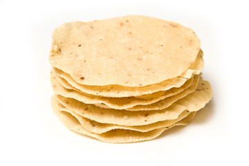Pappadoms isolated on a white studio background.