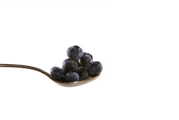 Blueberries on spoon