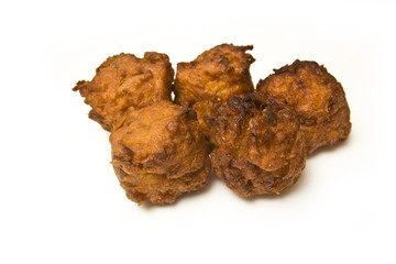 Onion Bhaji's isolated on a white studio background.