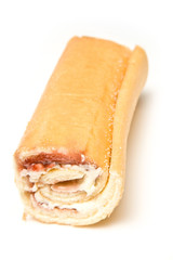 Swiss roll isolated on a white studio background.