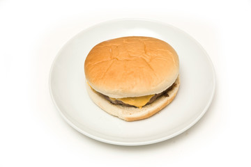 Cheeseburger isolated on a white studio background.