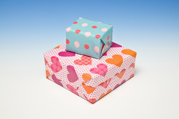 Presents or gift's on a graduated blue studio background.