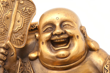 Cheerful Golden Hotei. Close-up