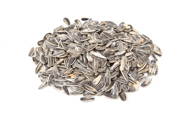 Sunflower seeds isolated on a white studio background.