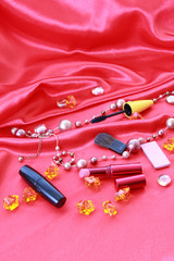 many cosmetic on the Textile background
