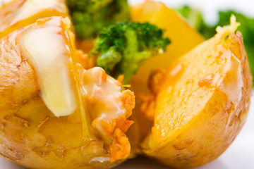 Baked potato on white plate