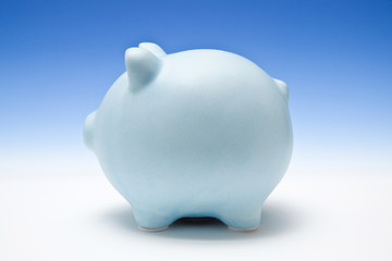 Blue piggy bank style money box.
