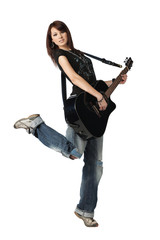 Fototapeta premium Teenager girl playing an acoustic guitar, isolated on white