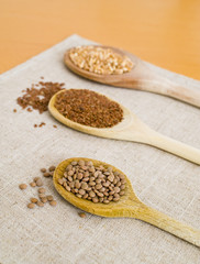 spoons, grain and legumes