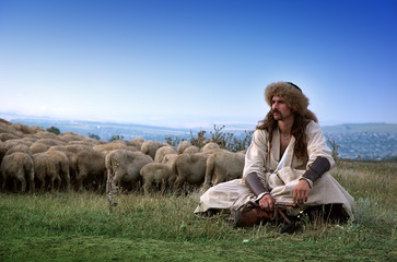 lonely shepherd with sheep
