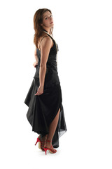Girl in black dress isolated on white background