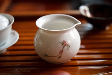a teacup on a wooden table