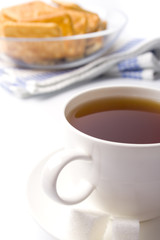 cup of tea, sugar and cookies
