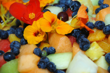 Fruit salad with nasturtium petals