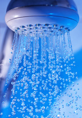 Plakat water flowing from the shower-head