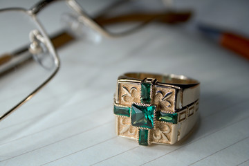 gold ring green cross