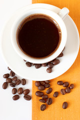 Cup of coffee and beans