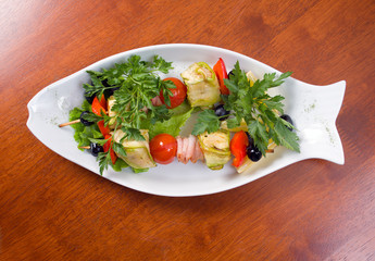 shish kebab from vegetables and meat