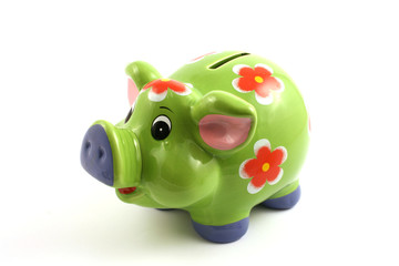 green piggy bank close up isolated in studio