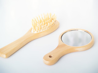 Mirror and hairbrush