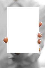 hand holds business card