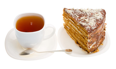 tea cup and piece of home made honey cake