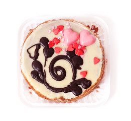 Cake with heart isolated on white