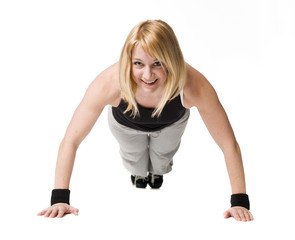 Fototapeta na wymiar Woman doing push ups