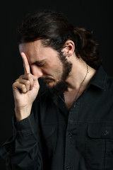 Young man is having a dilemma