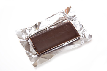 Swiss dark chocolate isolated on a white background.