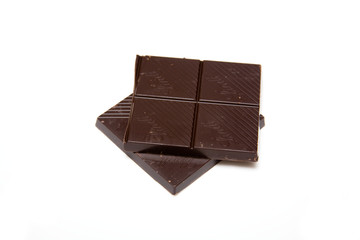 Dark chocolate isolated on a white studio background.