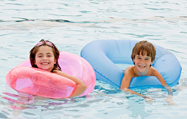 Friends Playing Together in the Pool