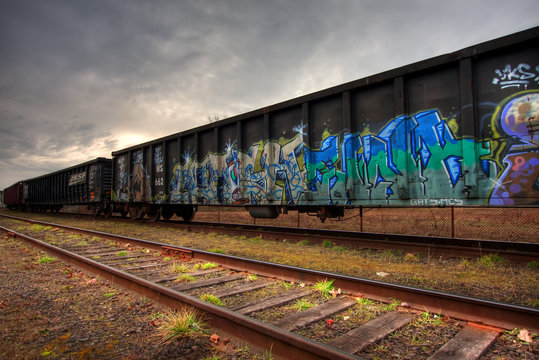 Fototapeta Rail cars parked on the tracks