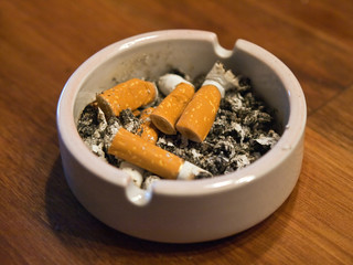 Ashtray full of Cigarette Butts