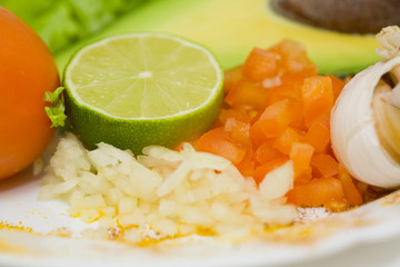Lime, tomato and onion