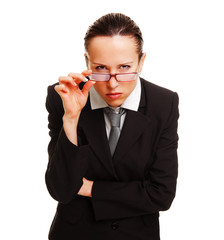 stern businesswoman gazing