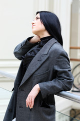 Obraz premium Young pretty woman standing in GUM. Moscow, Russia