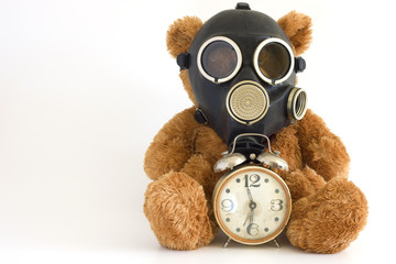 The Nursery toy, gas mask, old watch on white background.