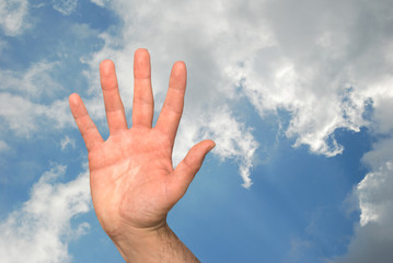 High five on sky background