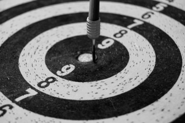 Target with dart arrow abstract sports background.