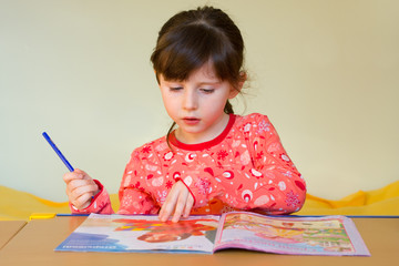 Girl reading magazine
