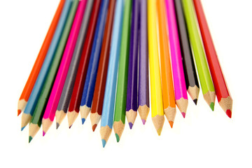 Colored pencils on white background