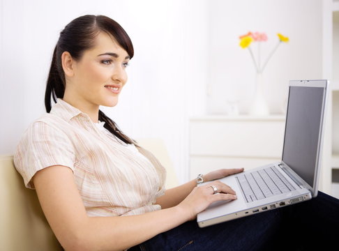 Woman using laptop computer