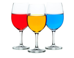 Three coloured wine glasses isolated on white
