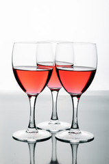 Three glasses of rose wine