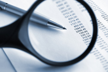 Financial  analyze with magnifying glass